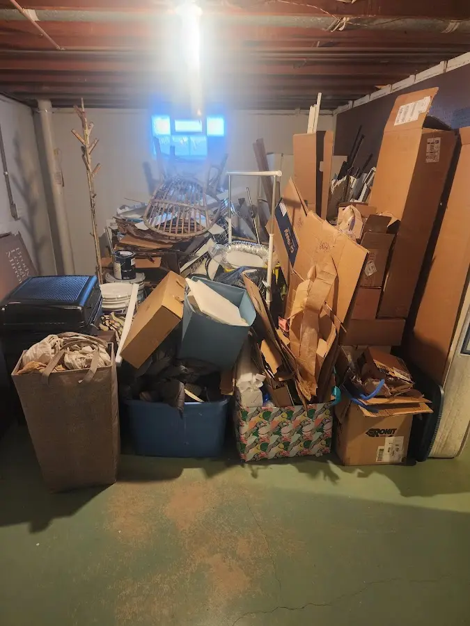 Roll-off dumpster container at job site for 20 Yard Dumpster Rental in East Greenwich